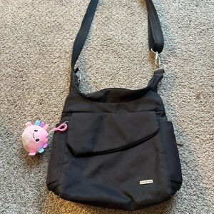 Travelon Black Crossbody Bag with Plush Charm